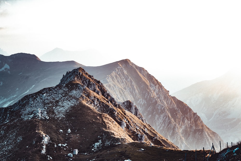 a mountain range with a few snow on it