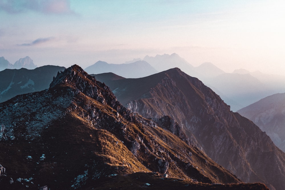 a view of a mountain range from the top of a mountain