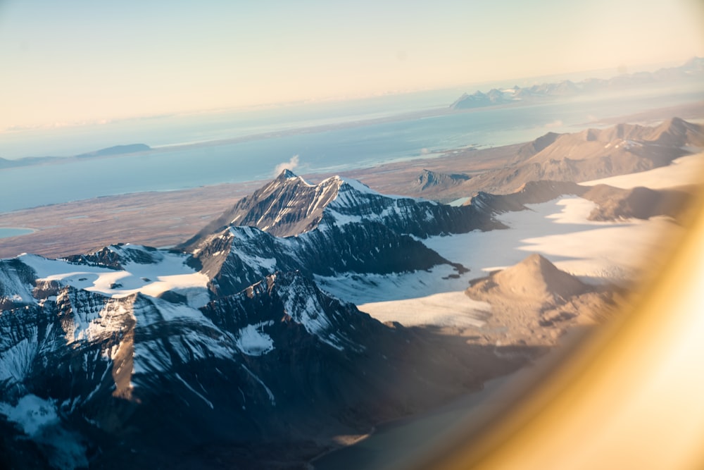 a view of a mountain range from an airplane window