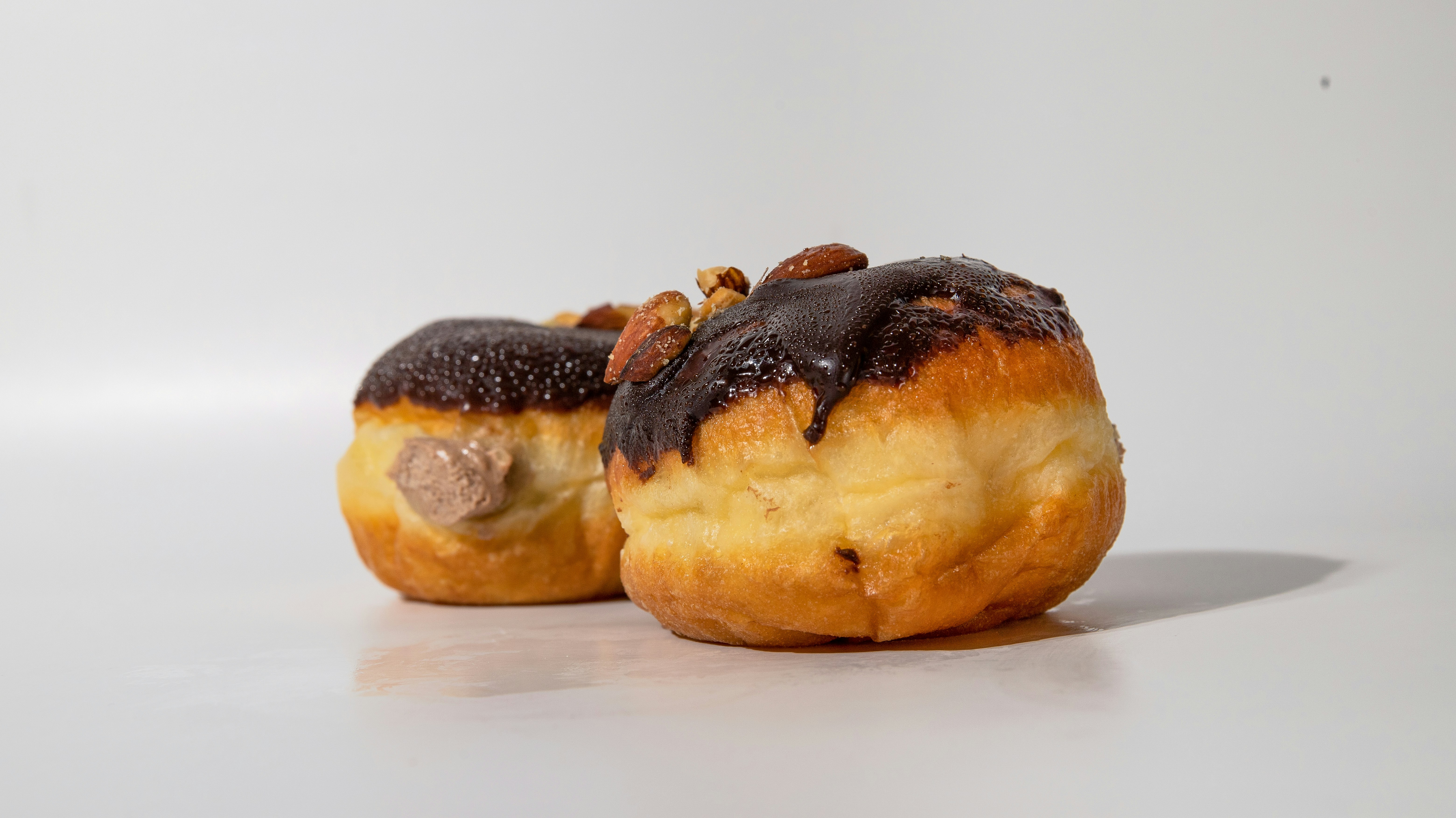 a couple of doughnuts sitting on top of a table