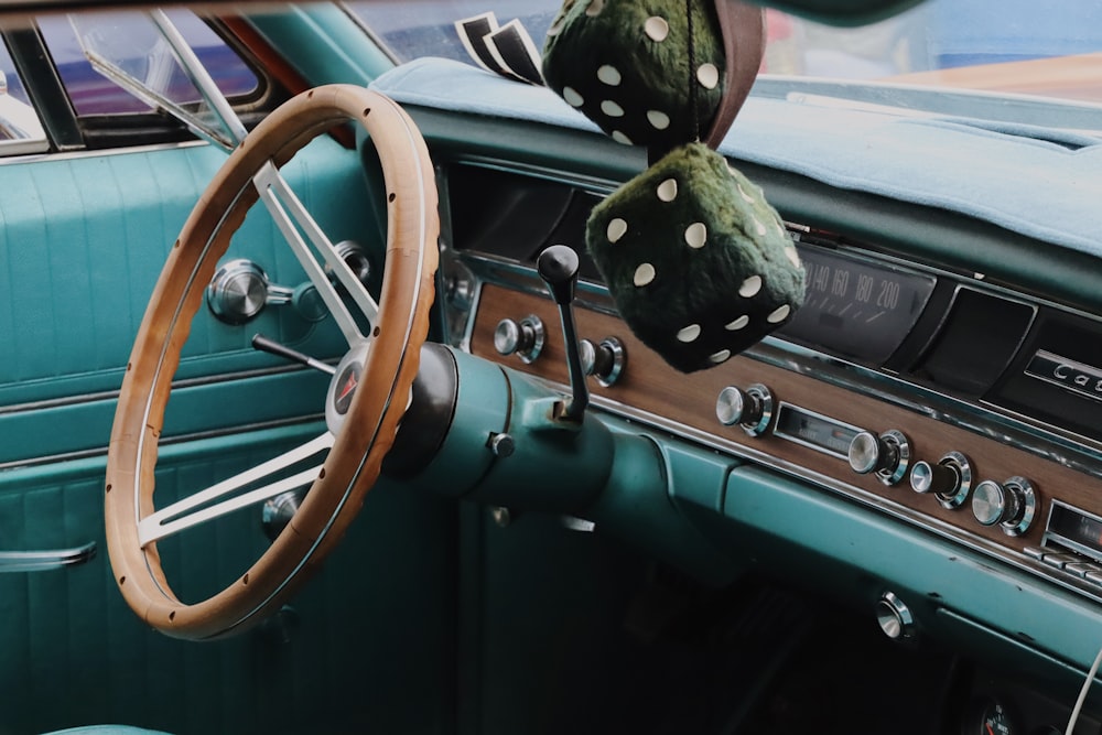 a steering wheel and dashboard of a car