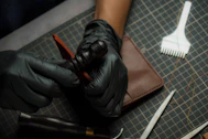 a pair of gloves and a pair of scissors on a table