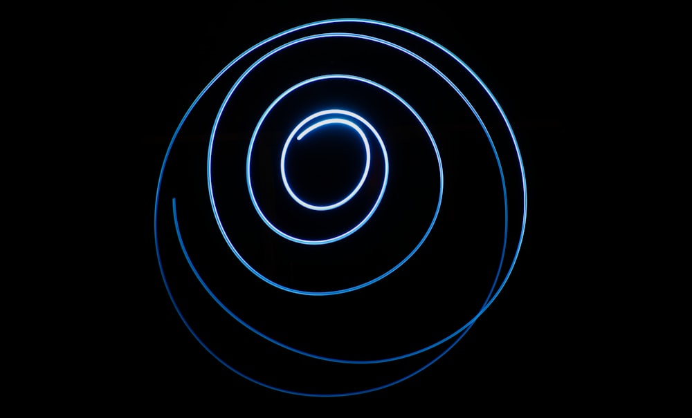 a black background with a blue circle in the center