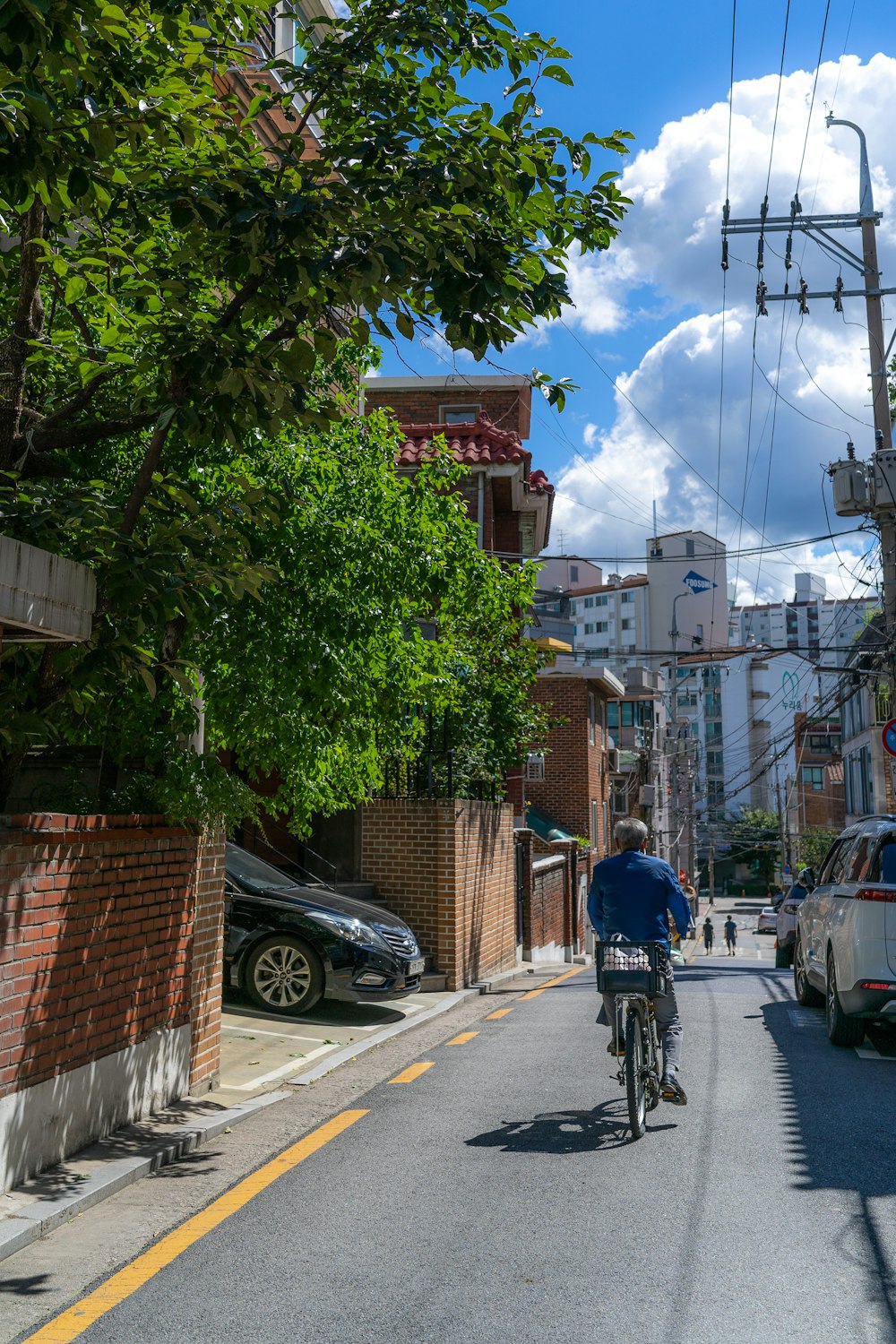 a man riding a skateboard down a street