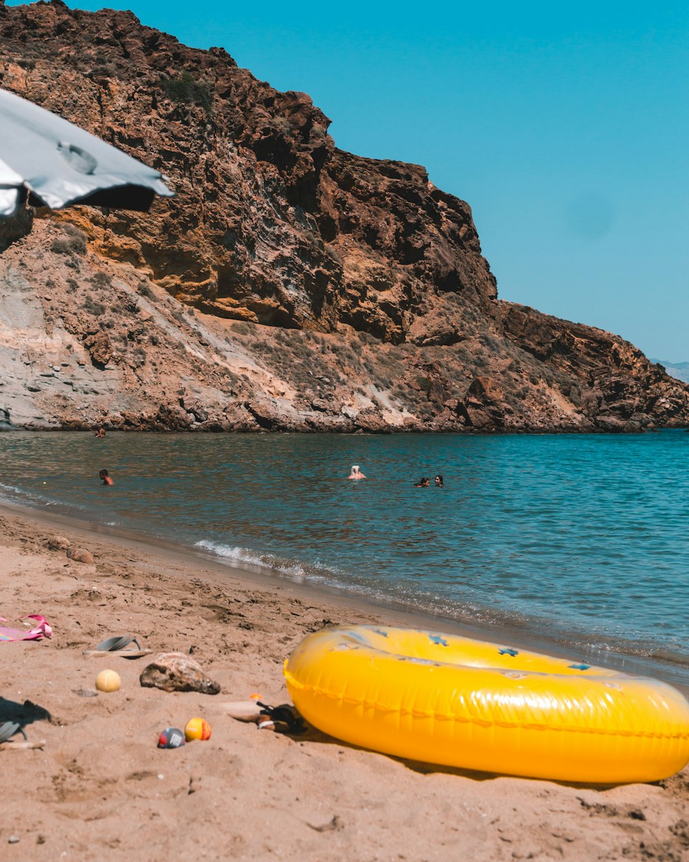 a beach with a mountain in the background