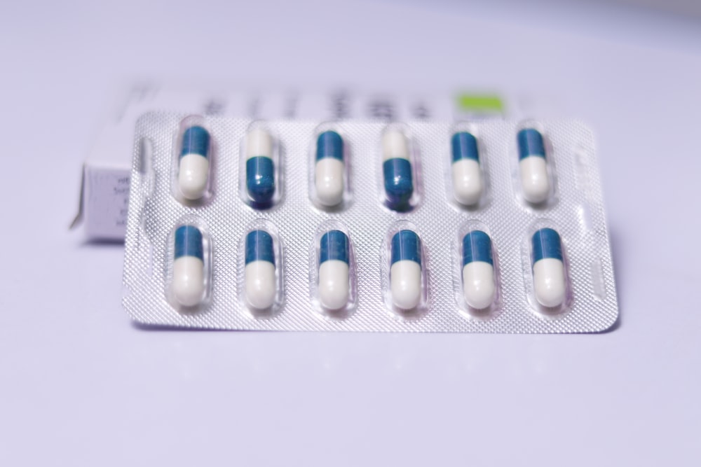 a close up of a pack of pills on a table