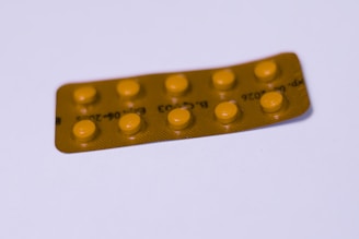 a yellow contraption sitting on top of a white table