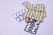 a group of pills sitting on top of each other