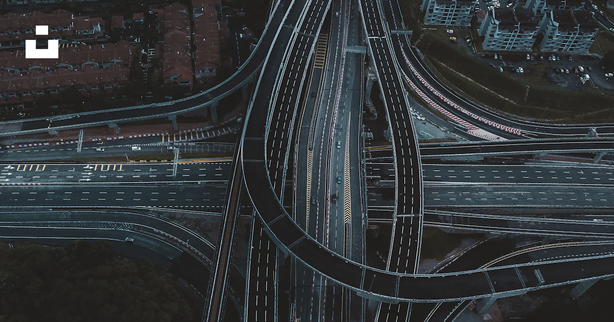 Multiple Intersections Bridge An aerial view of a highway intersection with multiple lanes photo ...