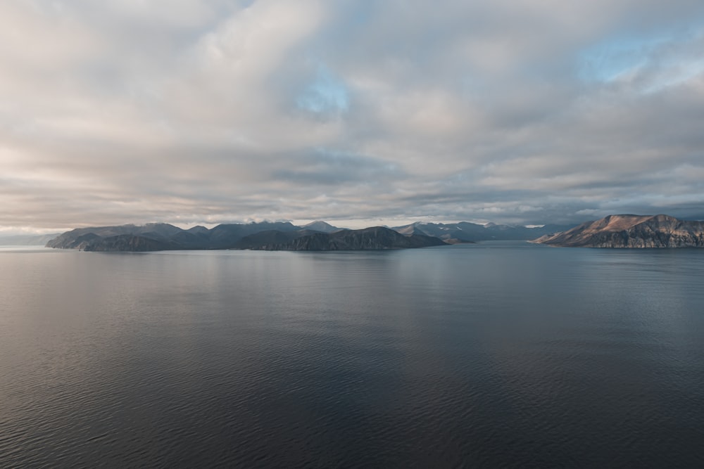 a large body of water surrounded by mountains