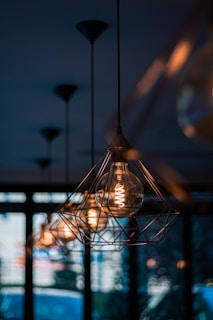 a group of light bulbs hanging from a ceiling