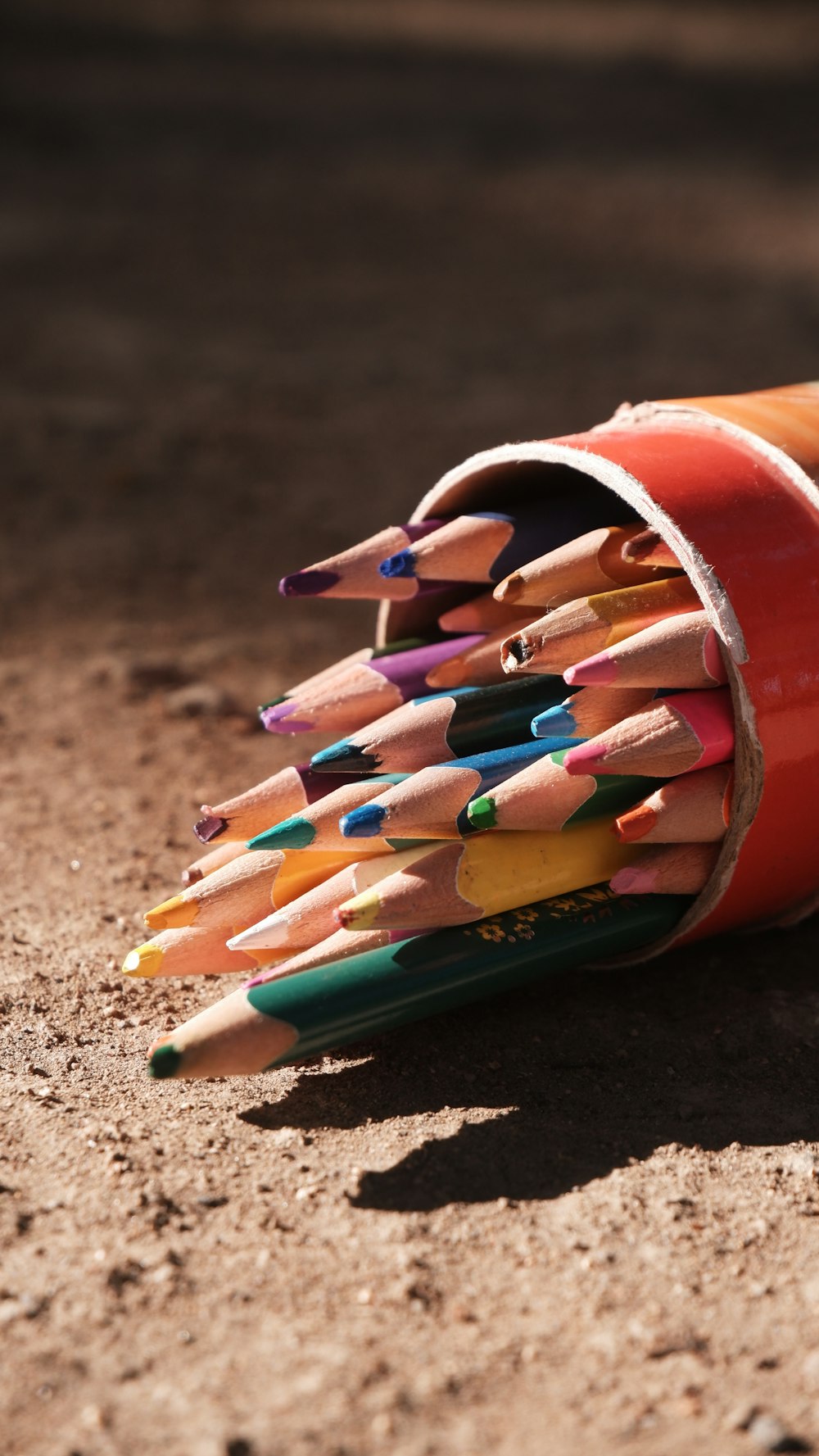 a bunch of pencils that are in a cup