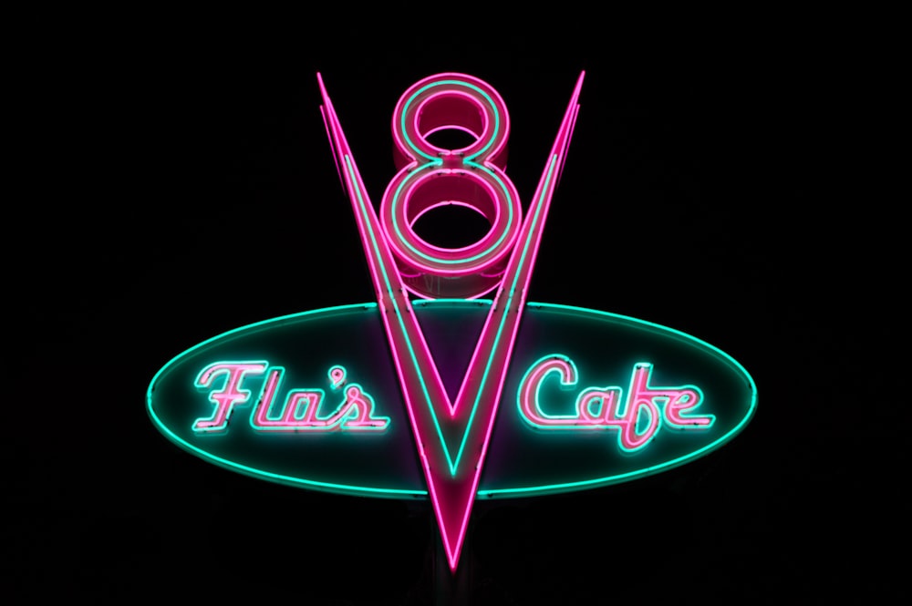 a neon sign for a restaurant called flix's cafe