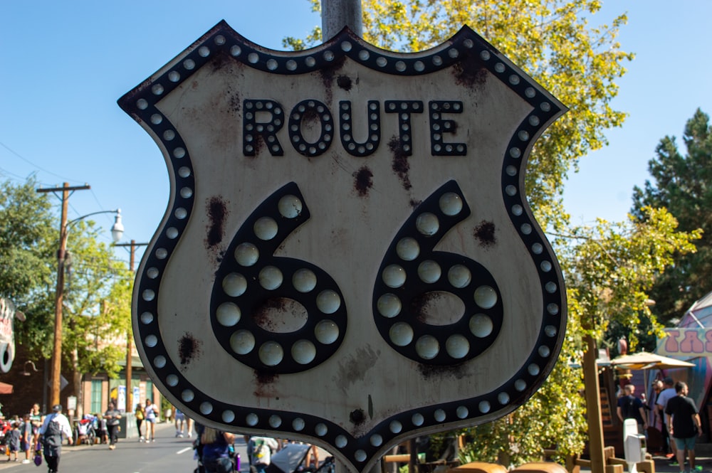 a close up of a street sign with a sky background