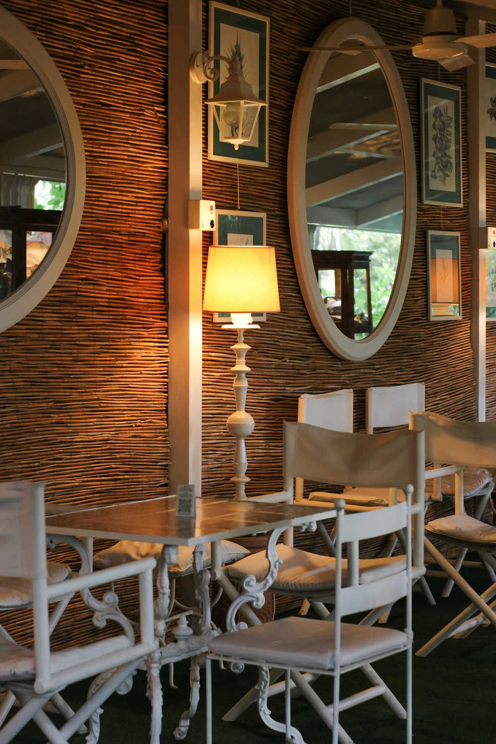 a dining room with chairs and a table