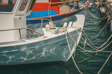 a couple of boats that are sitting in the water