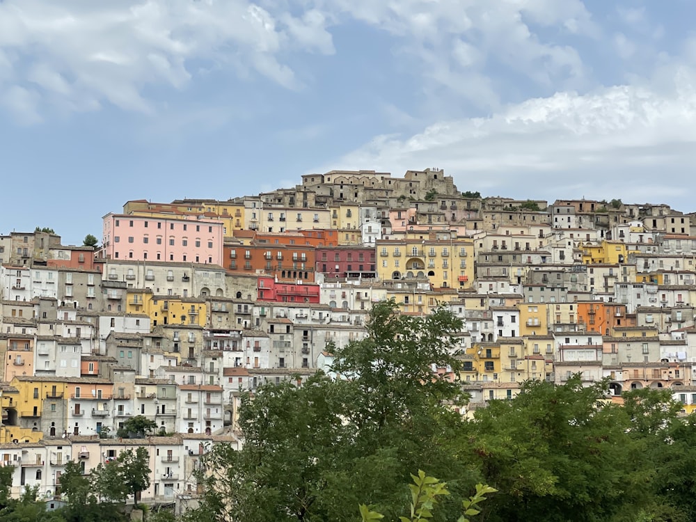 a large group of buildings on top of a hill