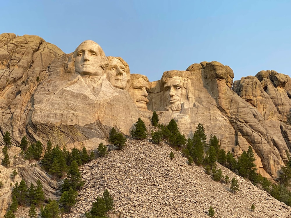 a group of presidents on top of a mountain