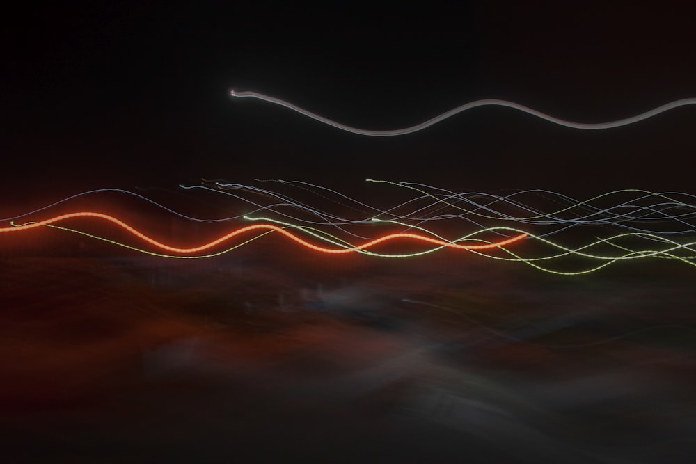 a blurry photo of a long exposure of lights