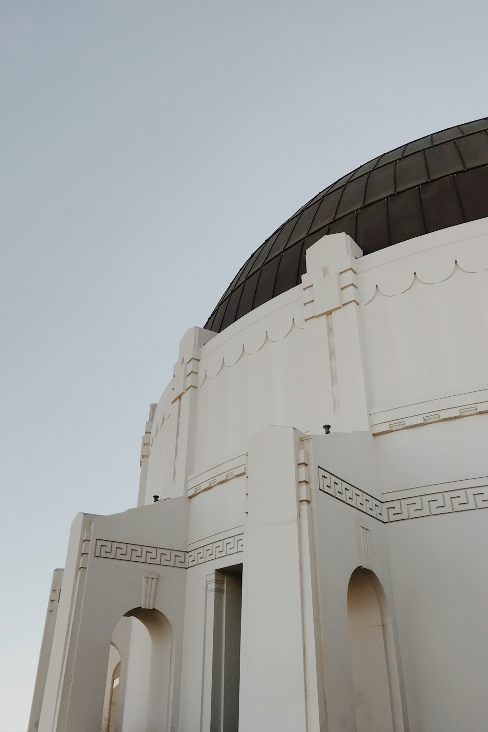 a large white building with a dome on top