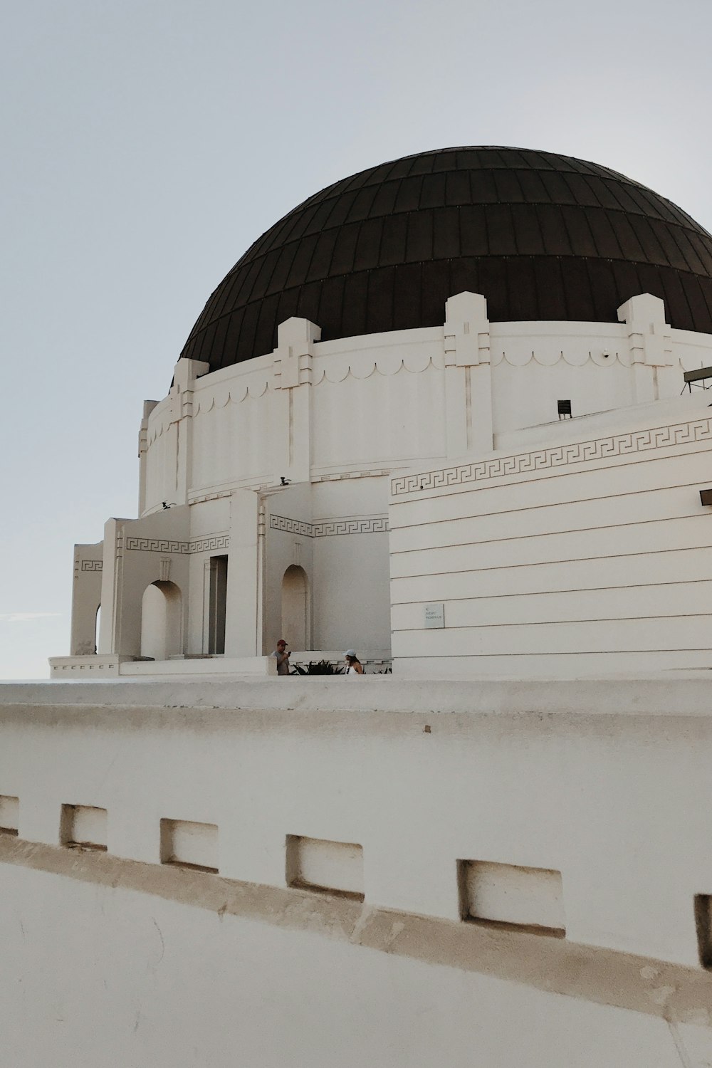 a white building with a dome on top of it