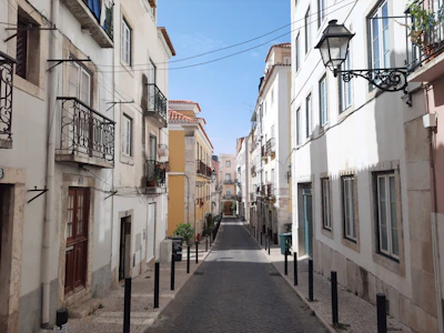 a narrow city street lined with buildings