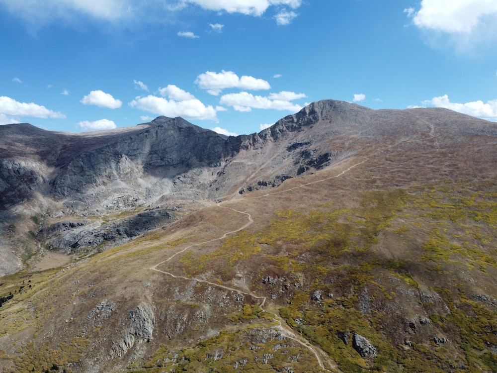 a view of a mountain range from a helicopter