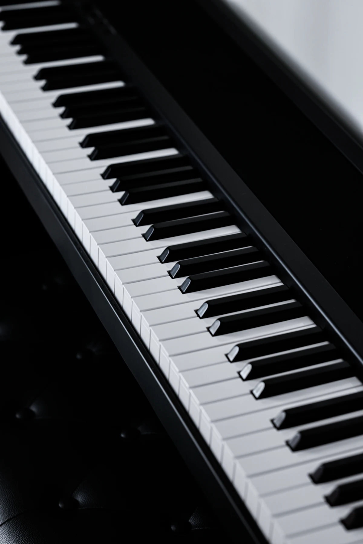 Piano keyboard resting on a table