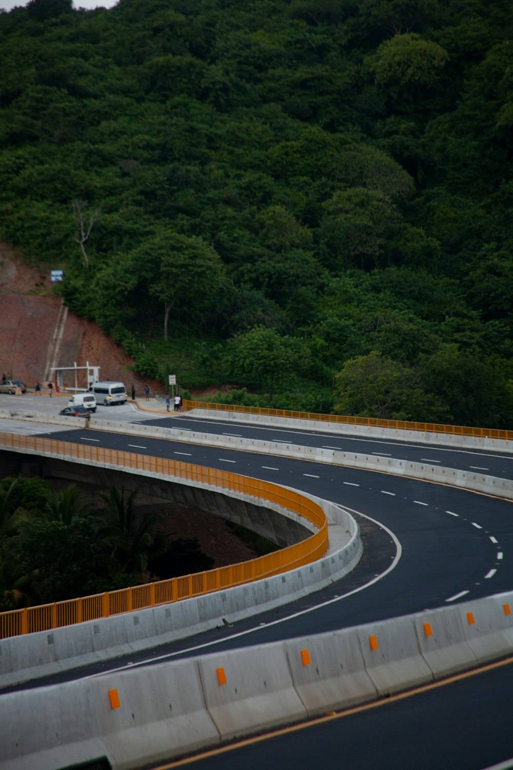 a view of a highway with a mountain in the background