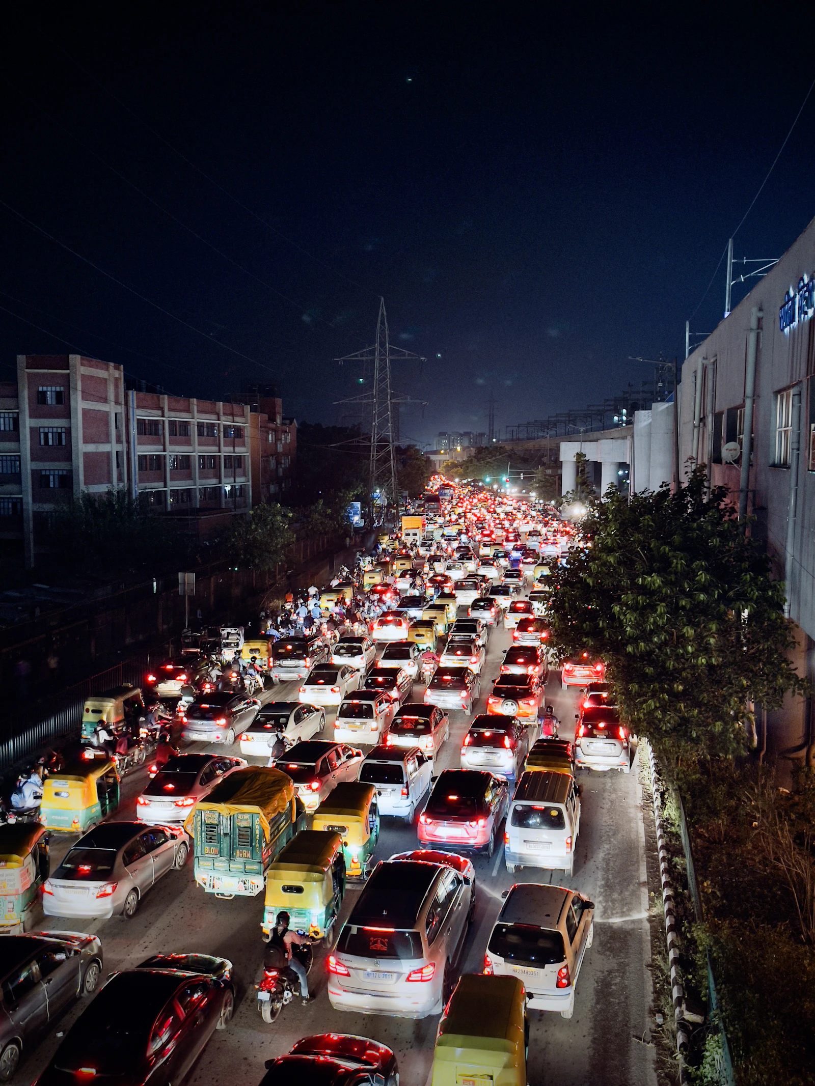 A busy city street filled with lots of traffic