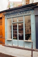 a store front with a car in the window