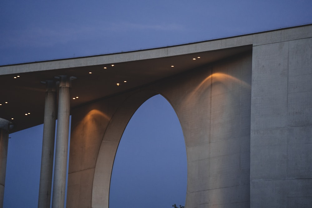 a very tall bridge with some lights on it