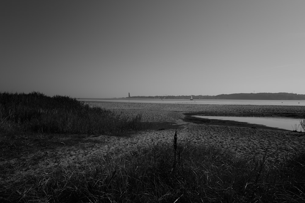 a black and white photo of a body of water