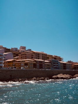 a view of a city from the ocean