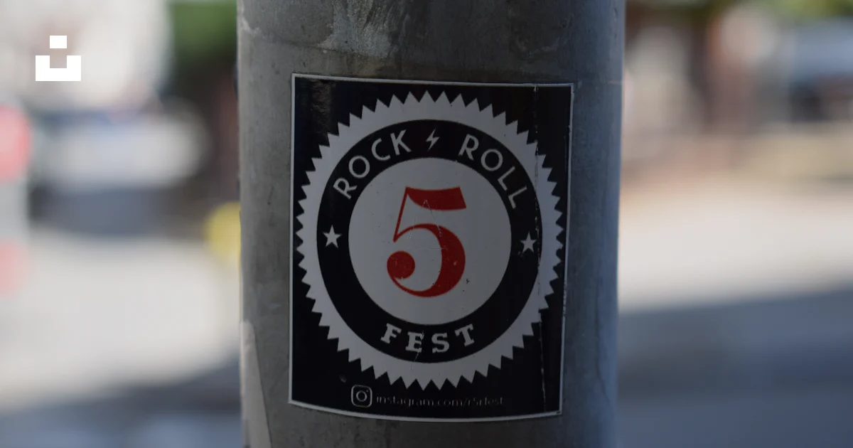 Lockn Fest Sticker A sticker on a pole that says rock and roll fest photo – Free Text ...