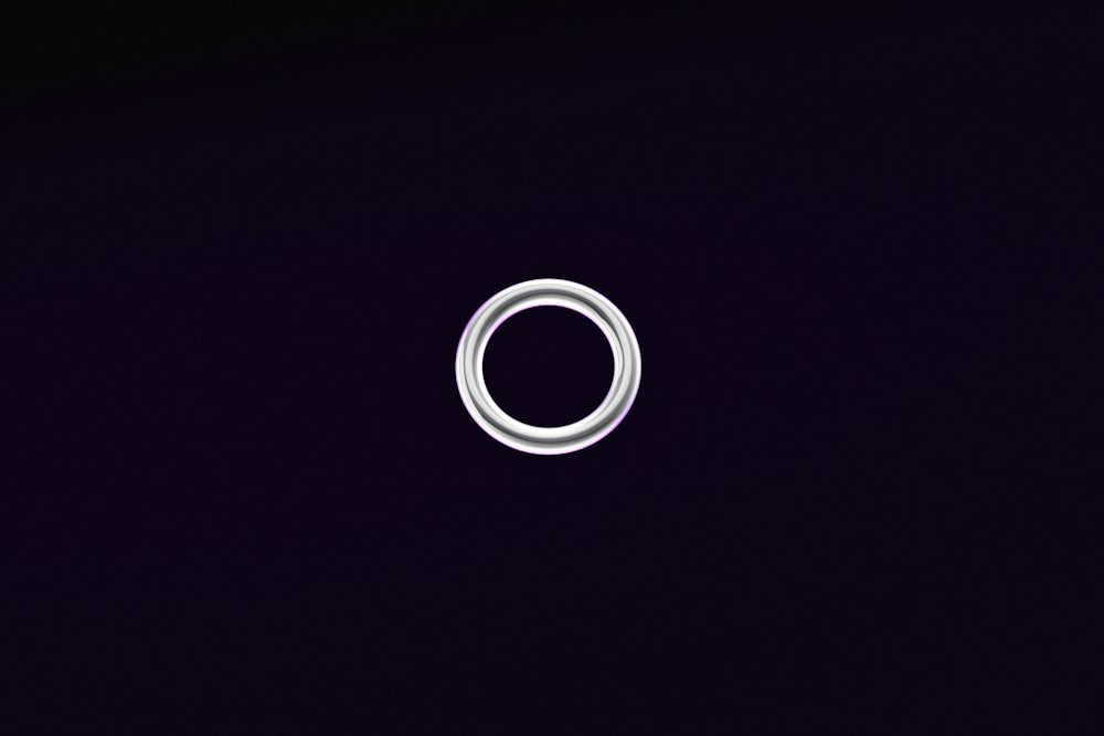 a white circle on a black background