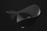 a black and white photo of an abstract object