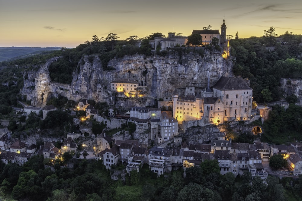 a village on top of a mountain at night