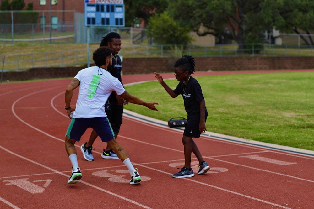 a group of young people playing a game of soccer