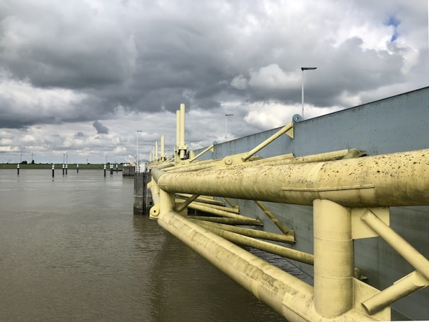 Workers inspecting flood barriers during a project.