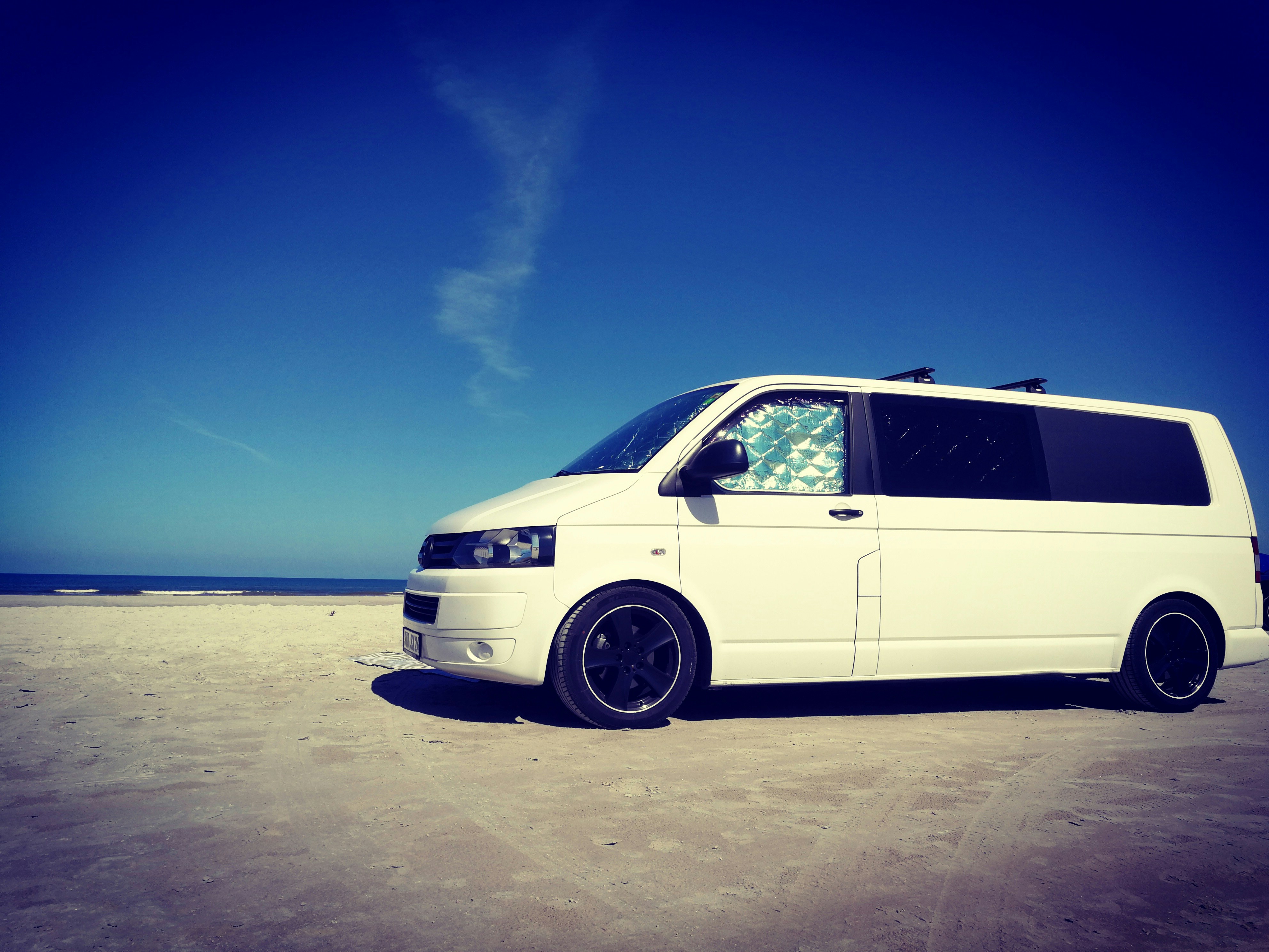 A white van for commercial use.