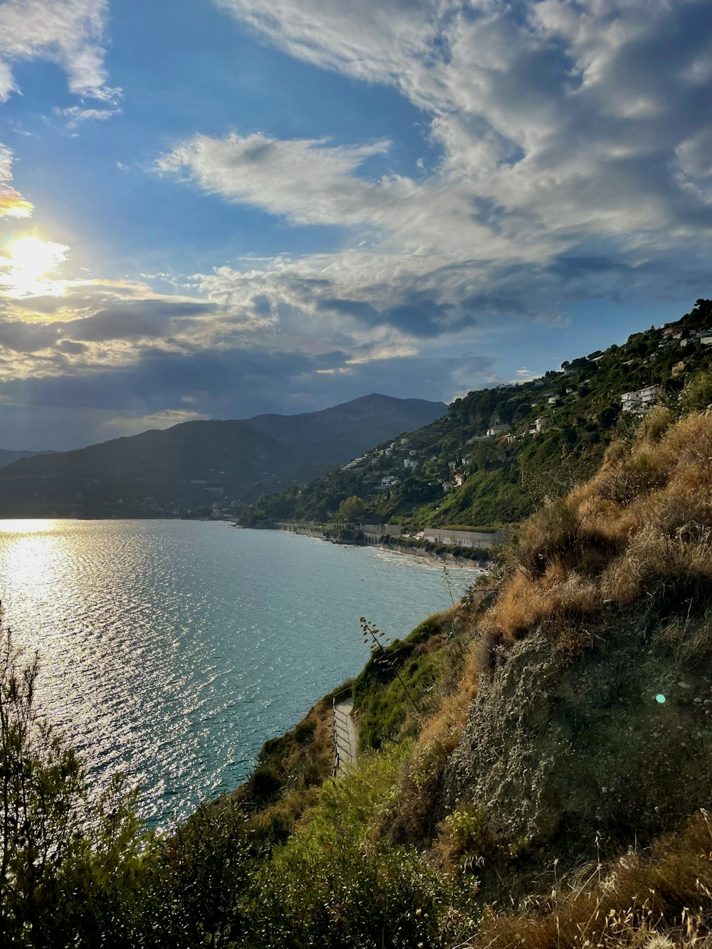 a view of a body of water from a hill