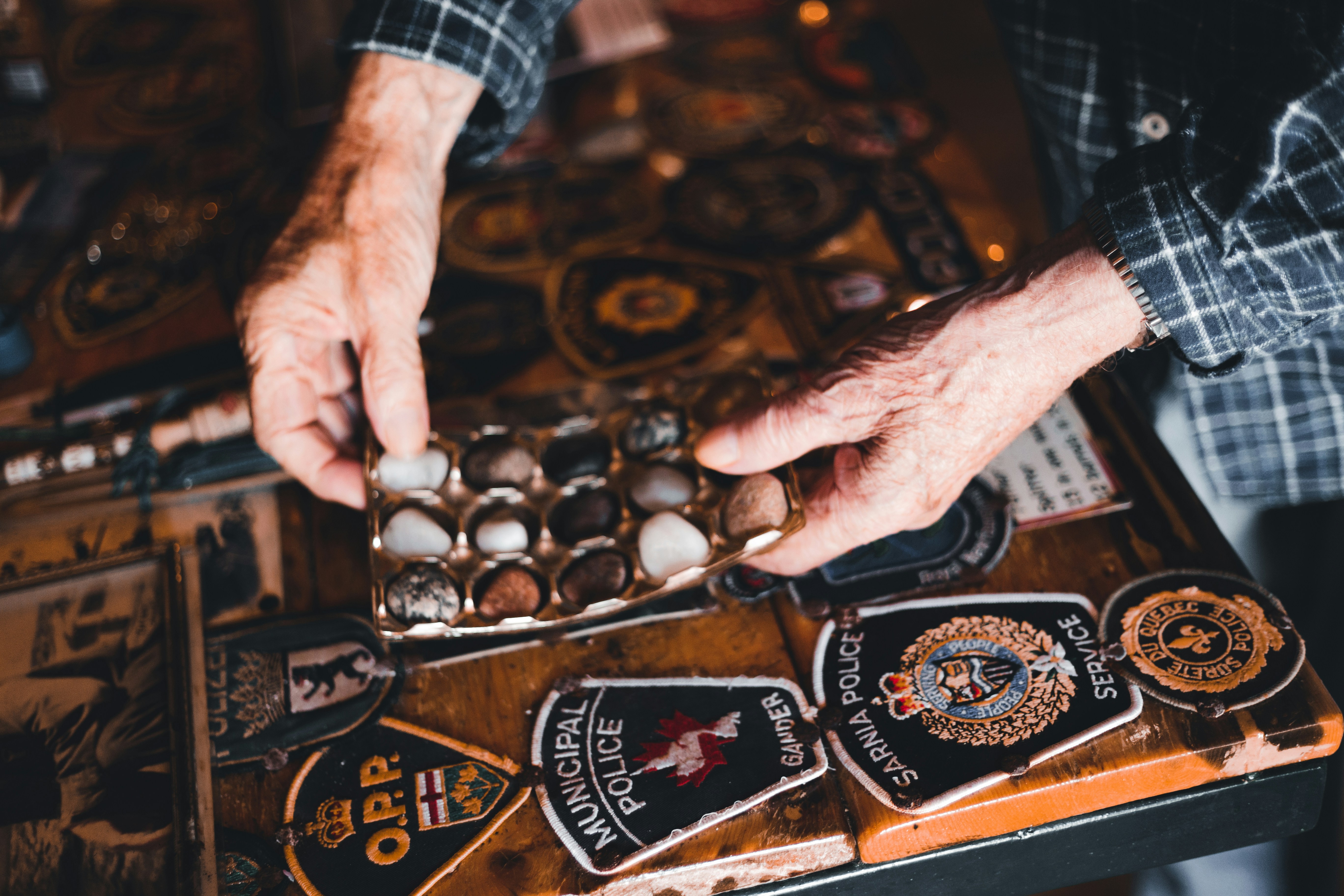 a close up of a person touching a button on a table