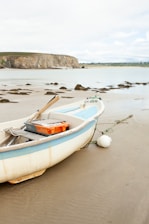 a small boat in a body of water