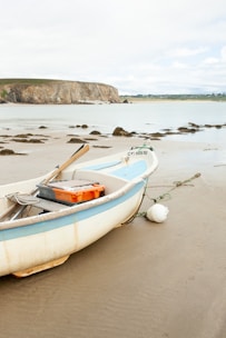 a small boat in a body of water