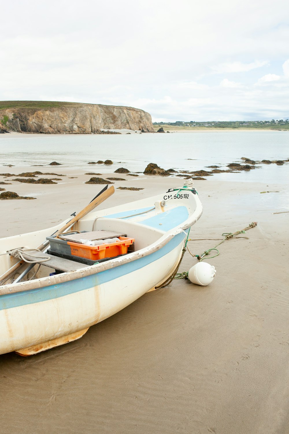 a small boat in a body of water