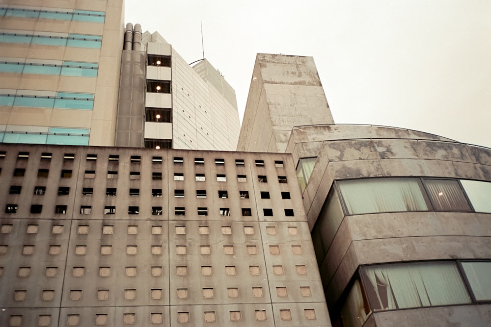 a very tall building next to a very tall building