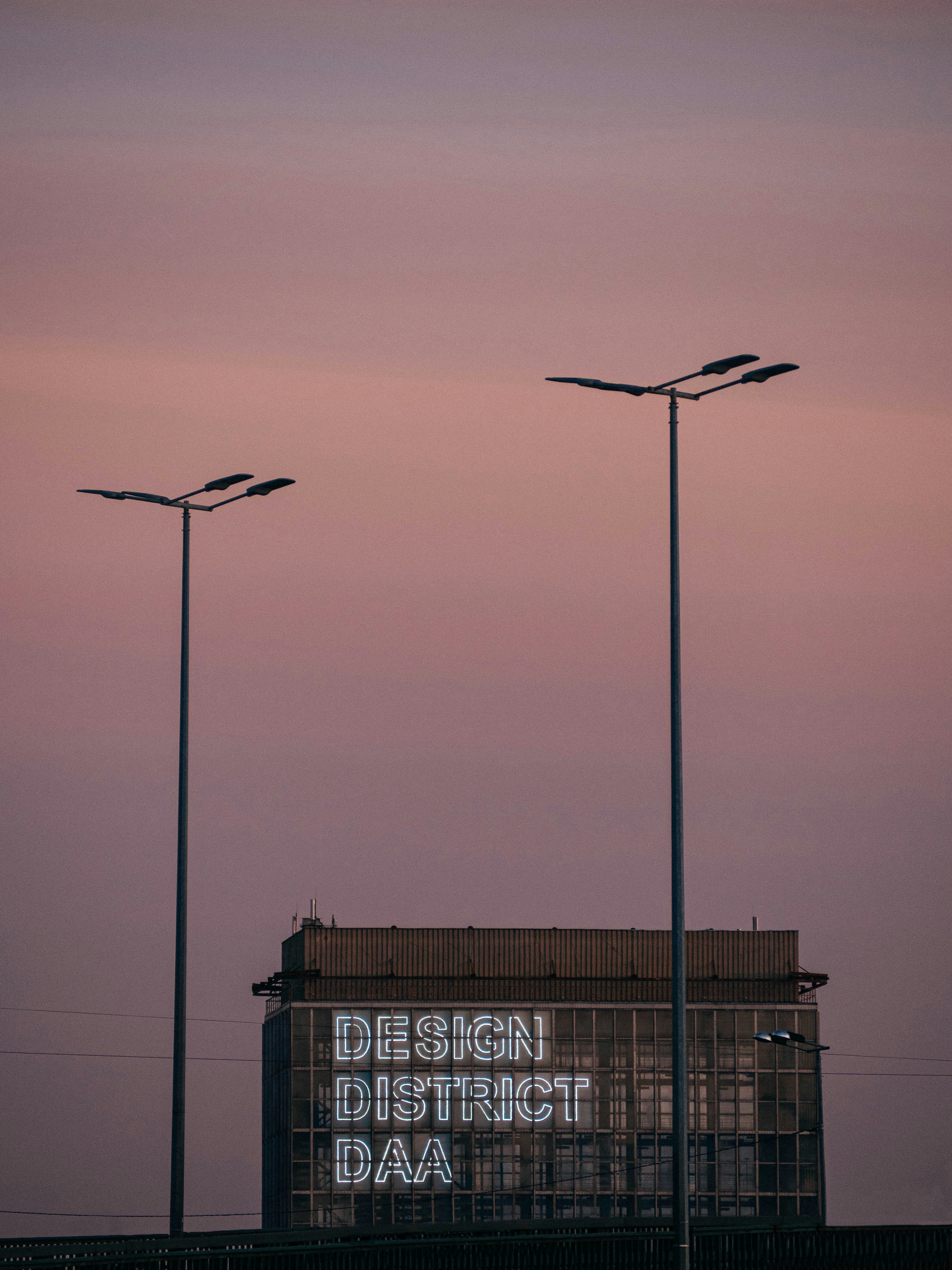 a building with a sign that reads design district daa