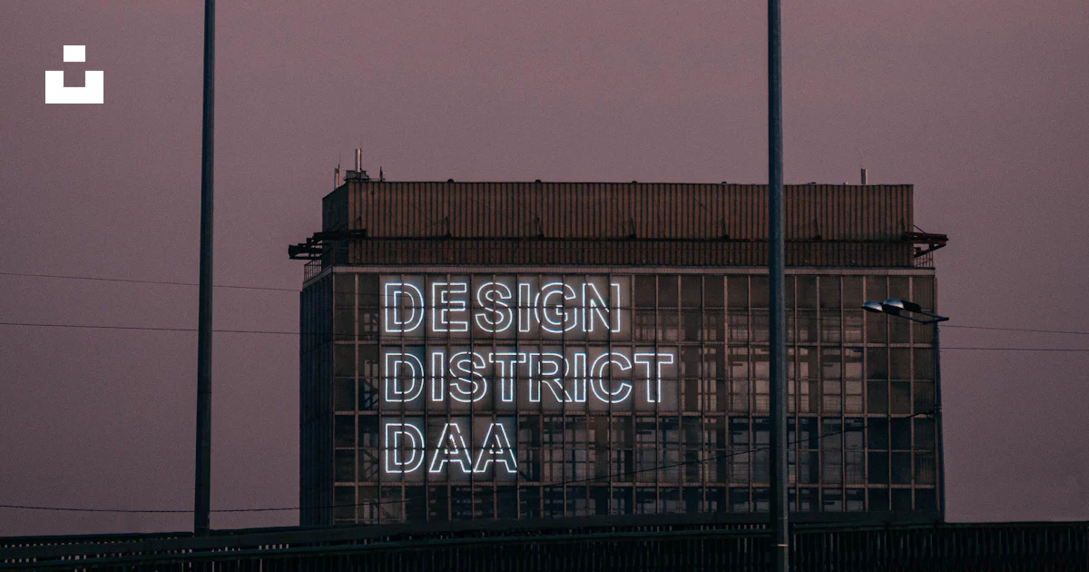 A building with a sign that reads design district daa photo – Free ...