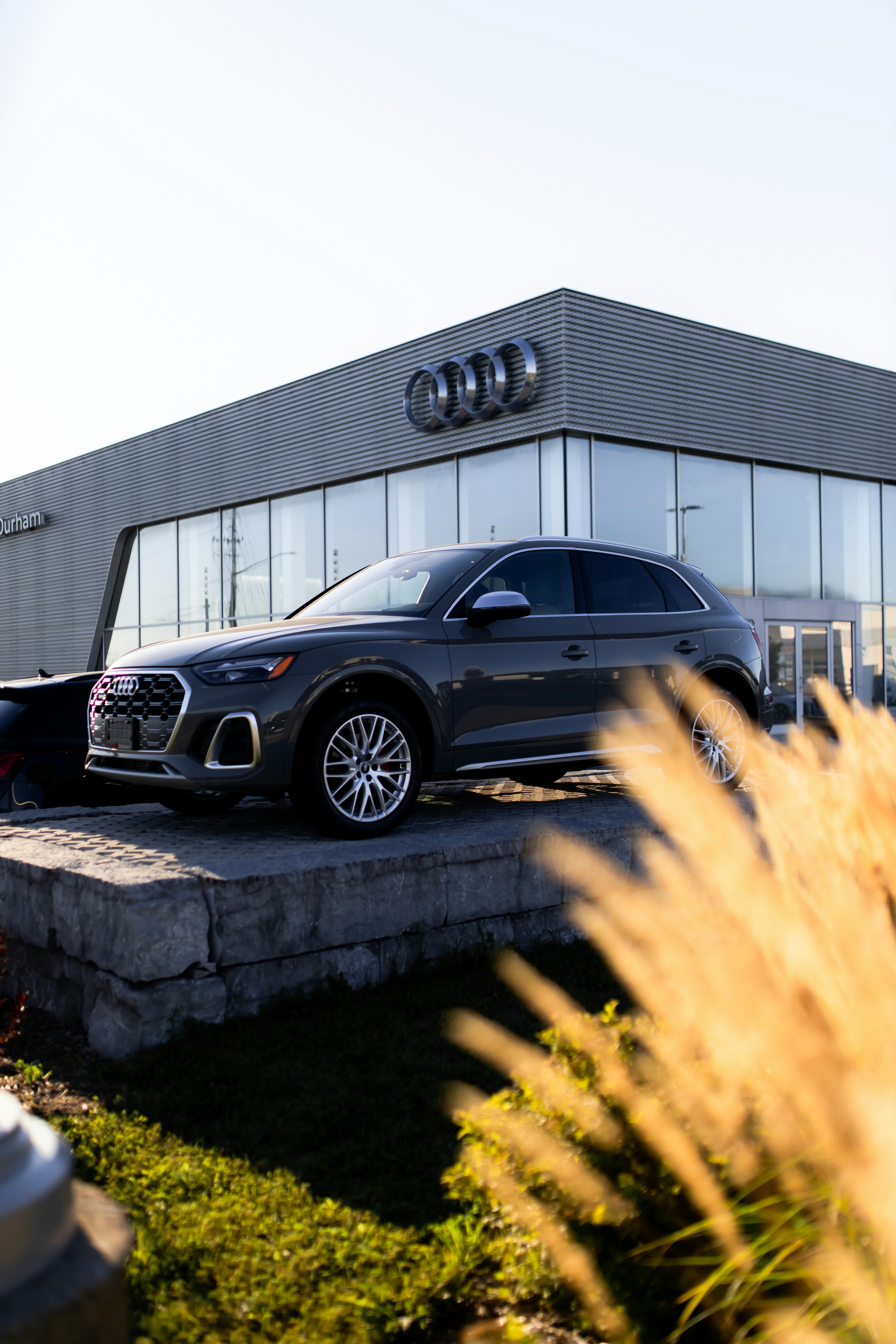 a car is parked in front of a building